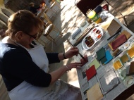 Anna preparing her hand made paper with pigments to create rich surface for drawing and painting.